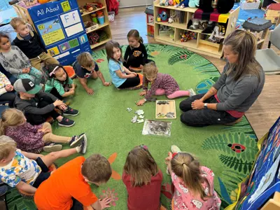 Preschool Kids sitting in a circle for story time