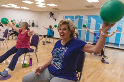 a lady participating in a fitness classs