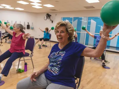 a lady participating in a fitness classs
