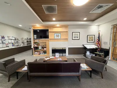 couches and fireplace in a senior center