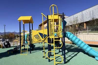 Yellow and blue playground at the Louisville Recreation & Senior Center