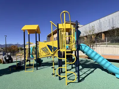 Yellow and blue playground at the Louisville Recreation & Senior Center
